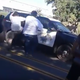 An angry mob attacks a California Highway Patrol vehicle with the officer still inside on Sept. 25, 2016.
YouTube screenshot
